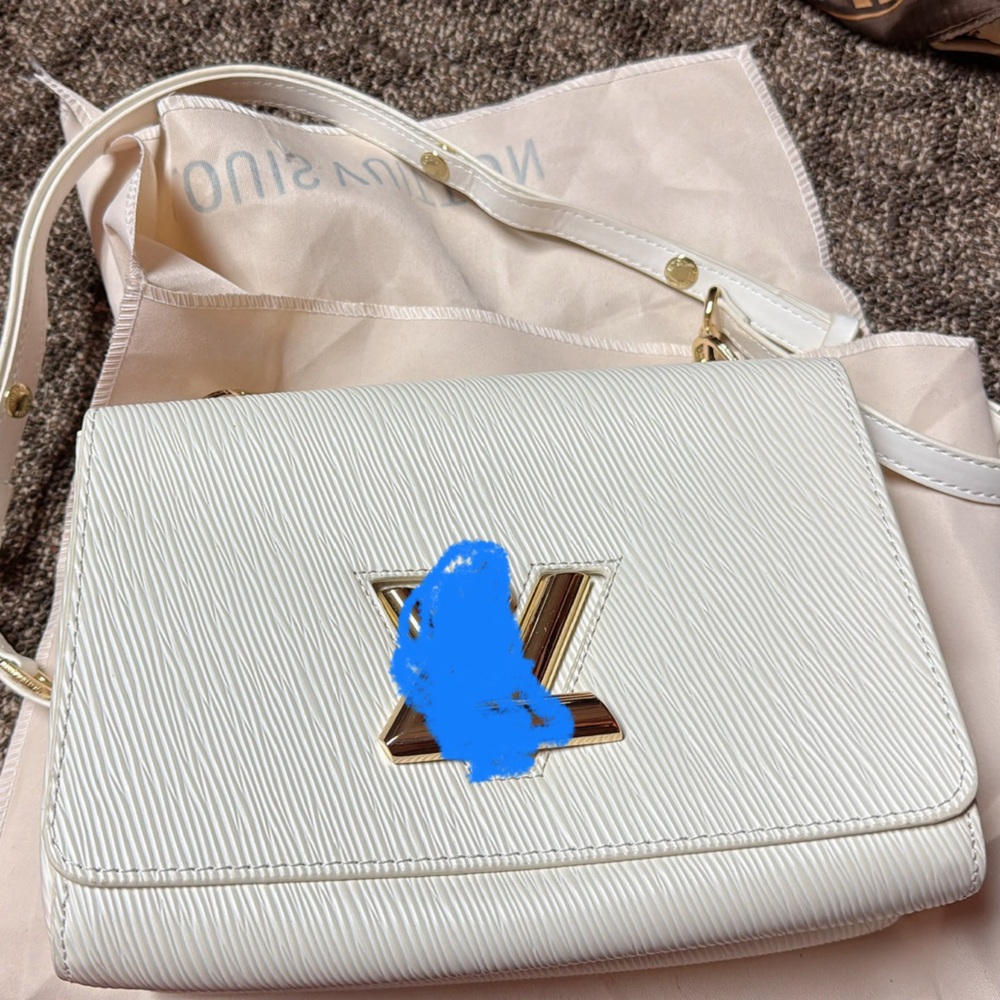 Elegant White Clutch with Gold Accents